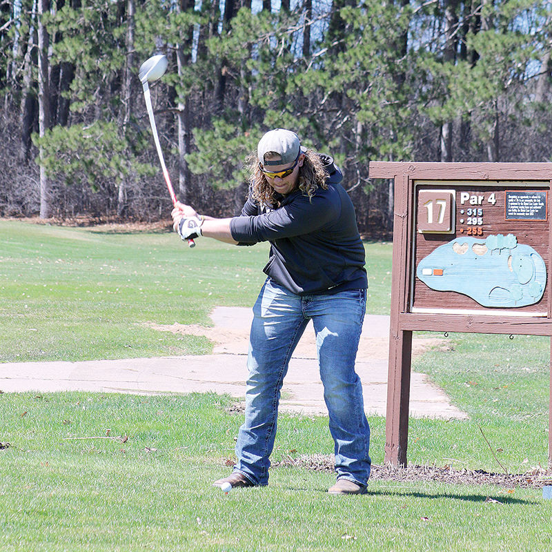 Zane Baier tees off